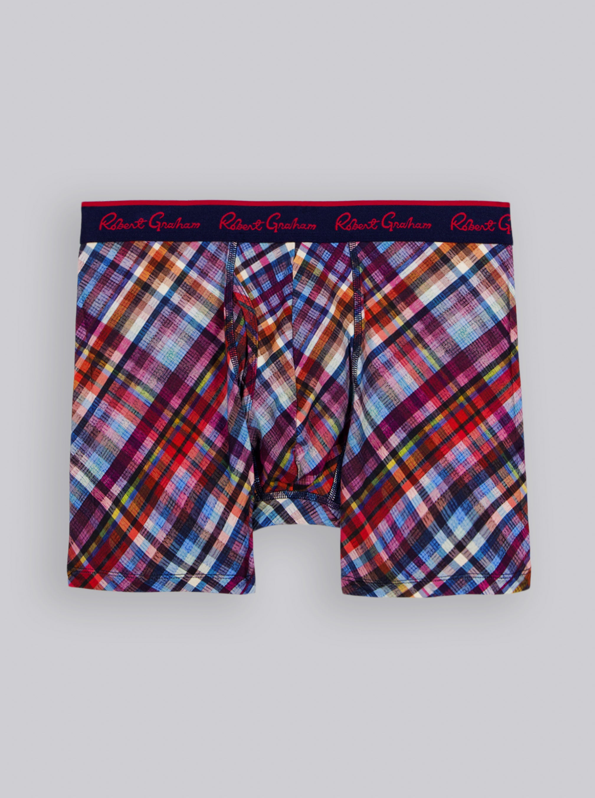 Plaid patterned boxer briefs with brand label on a light gray background